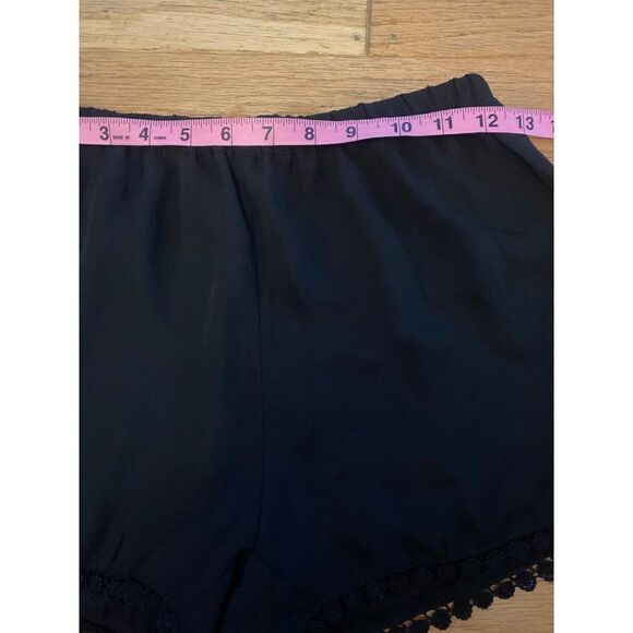 Brandy Melville, women's black elastic waist shorts with fringe hem - Picture 6 of 8